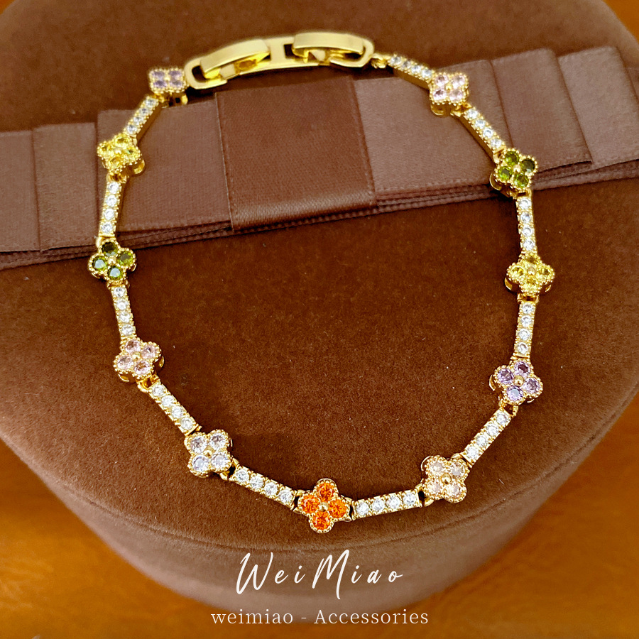14 quilates de oro verdadero electrón de diamante de hierba afortunada flor pulsera de fichaje pulsera ligera de lujo nicho temperamento delicado joyas de pulsera
