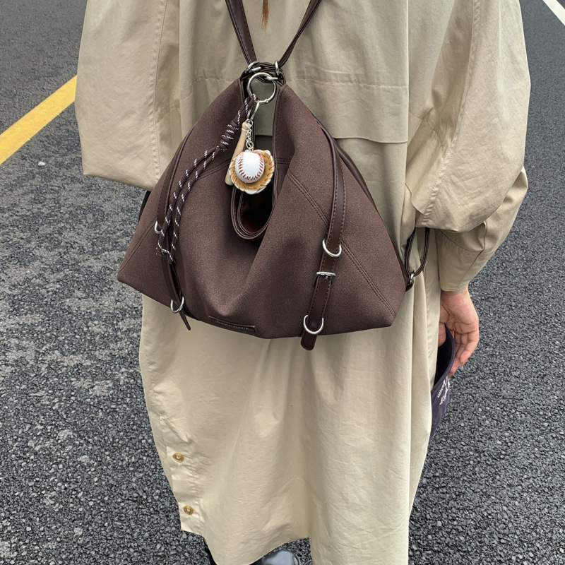 Simple y de gran capacidad, lazo viento viaje bolsa para mujeres 2025, otoño y invierno nueva moda bolso de hombro, mochila universal
