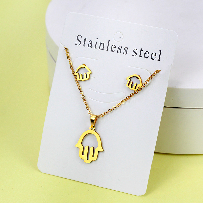 Conjunto de collar de pendientes de oro de acero inoxidable europeo y americano, collar de mariposa de amor de diamante, colgante, cadena de clavícula, fábrica al por mayor