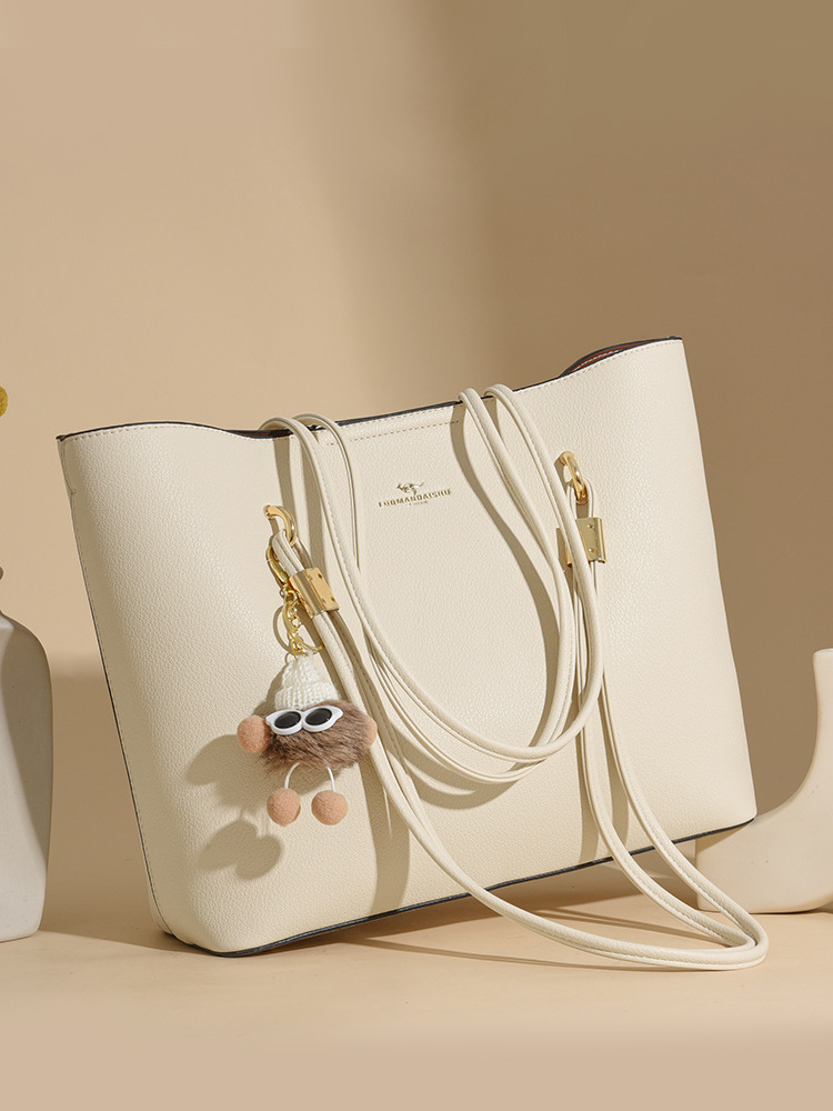 Nueva moda de mujer atmósfera bolso de mujer para enviar a la madre un paquete de hombro grande, envío gratuito.