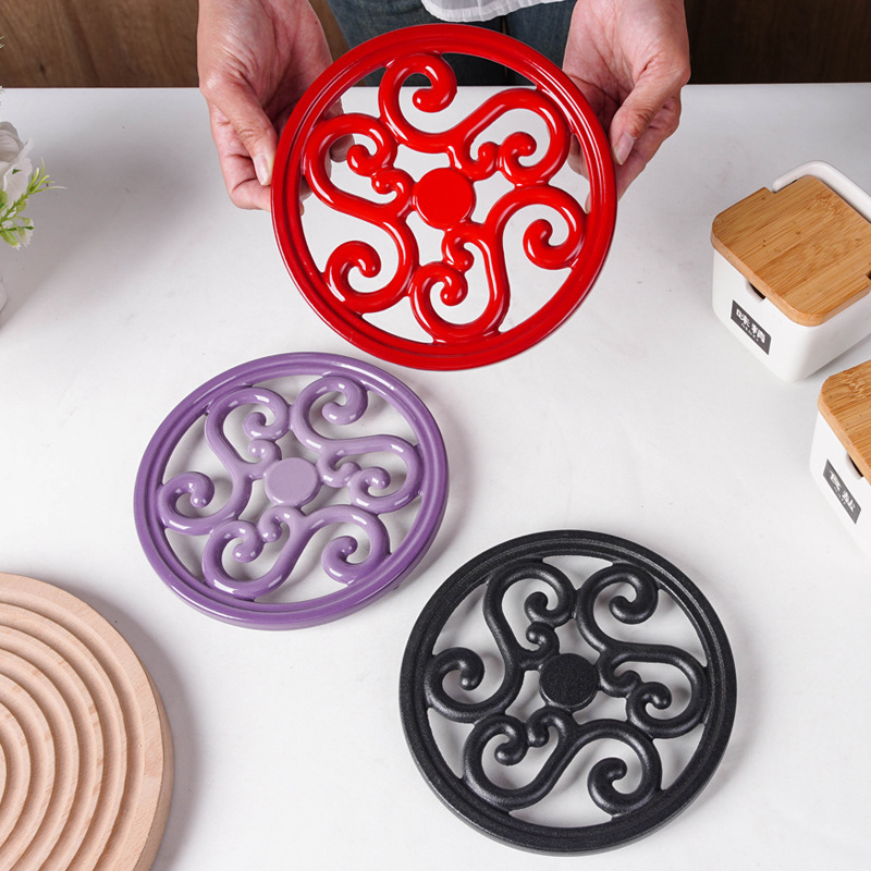 Cojín aislante de esmalte de hierro fundido nuevo cojín de mesa de comedor chino resistente a quemaduras cojín de platos resistente a altas temperaturas