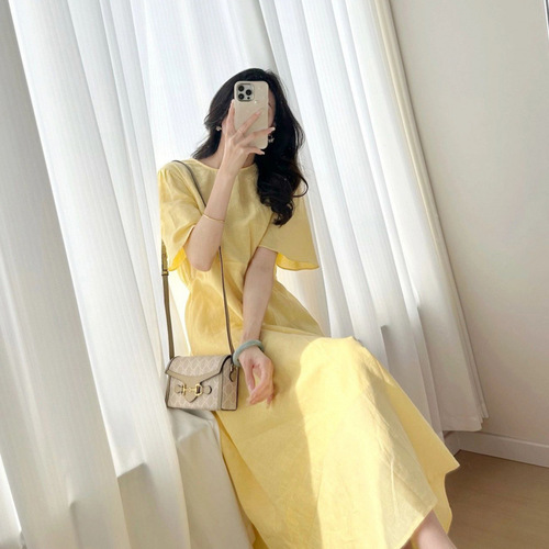 A charming French-style tea party dress for women that captivates at first glance, perfect for summer 2025 vacation fashion.