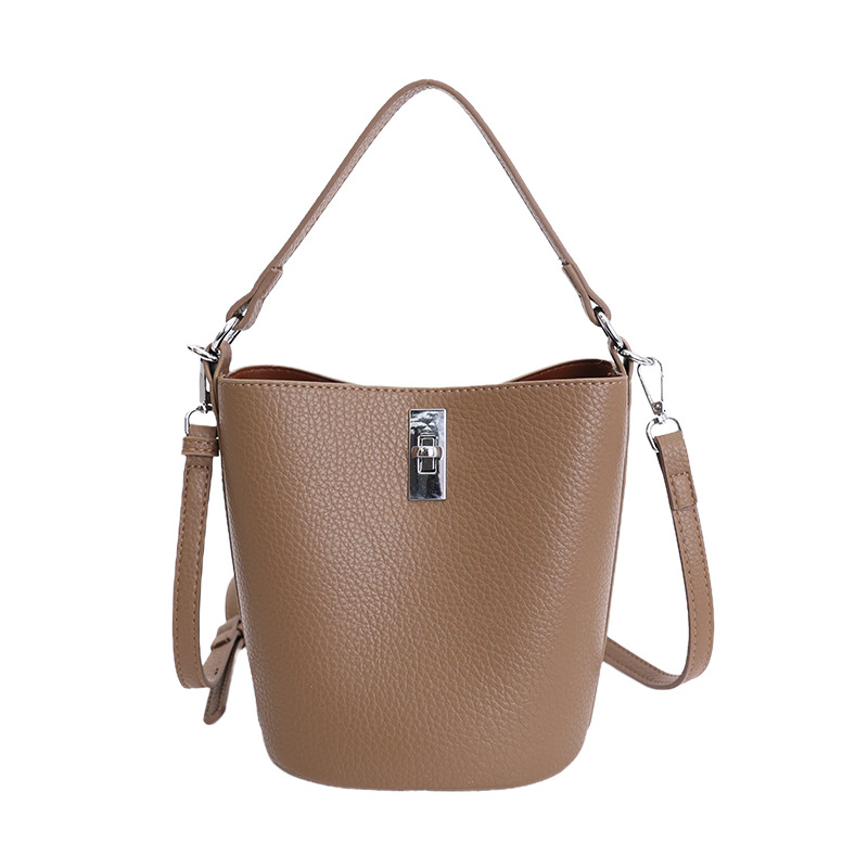 Bolso de nicho coreano portátil cubo de agua bolso para niños ventas calientes nueva textura de alta calidad lujoso ligero ocio versátil bolso de mochila