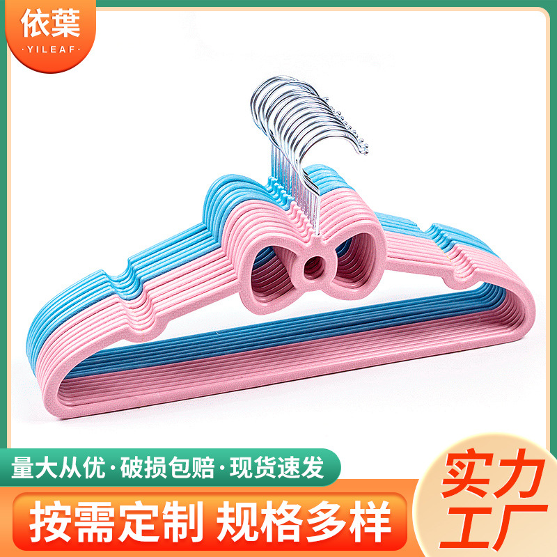 Fuchsia plastic universal hanger with bow