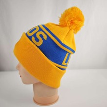 球队帽子字母提花针织帽子带毛球男女通用秋冬季节加厚保暖时尚款