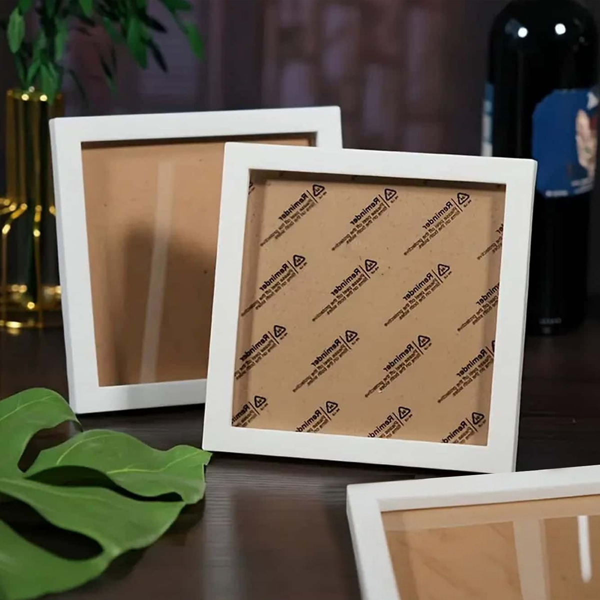 white plastic square photo frame