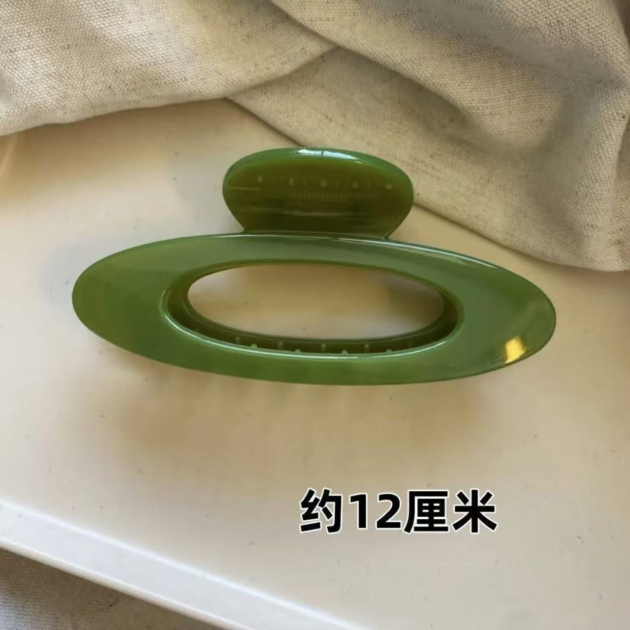 Green hollow oval