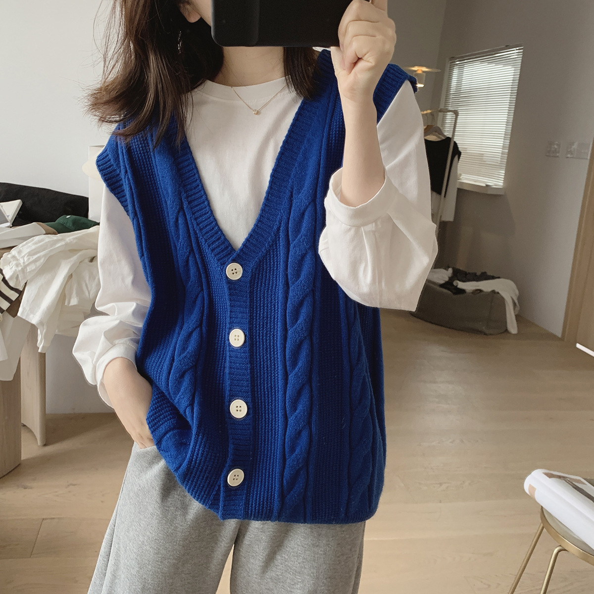 Chaleco de punto con cuello en V para mujer a principios de primavera y otoño 2024 nueva ropa de mujer Chaleco de estilo coreano con reducción de edad