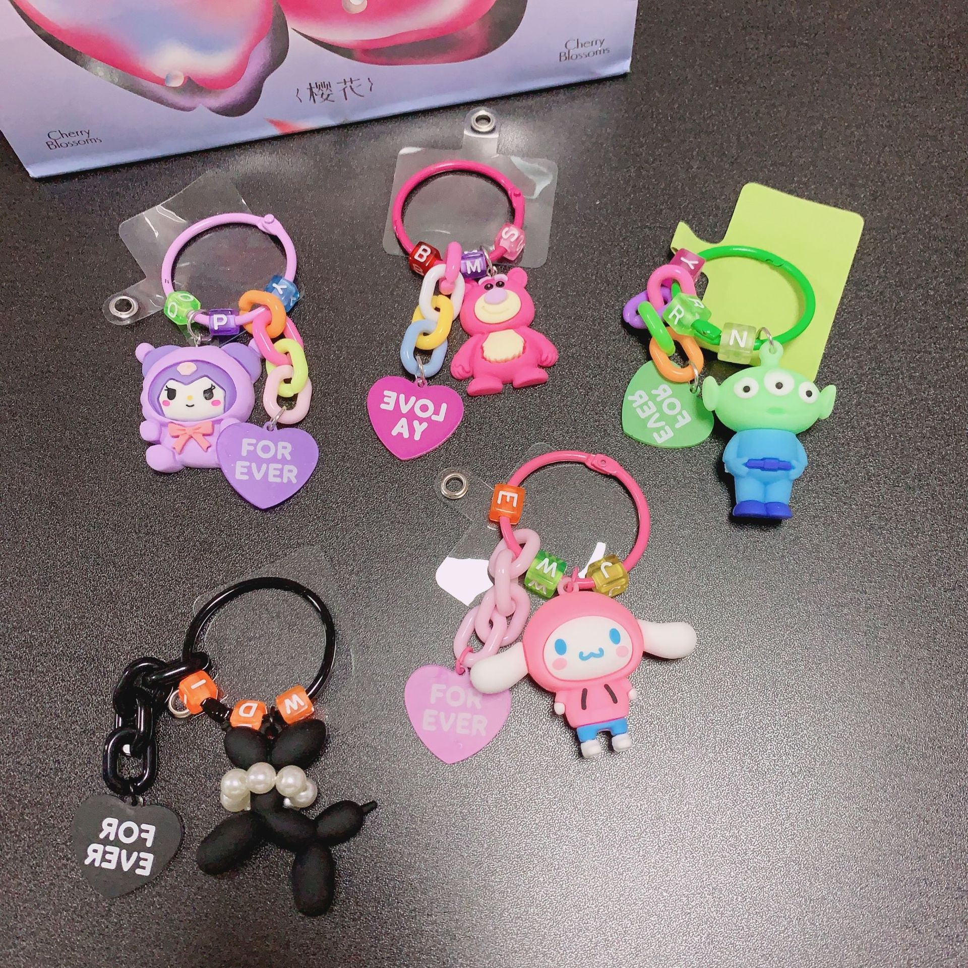 Muñeca de dibujos animados par teléfono caso colgante tres ojos/coolomi colgante Año Nuevo hongshun colgante Decoración