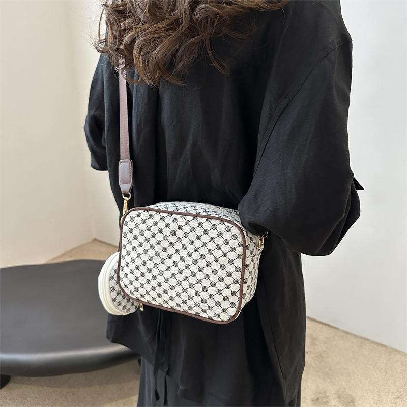 2024 nueva moda simple retro bolso impreso de mujer extranjero ancho cinturón de hombro bolso de hombro casual bolso de mochila