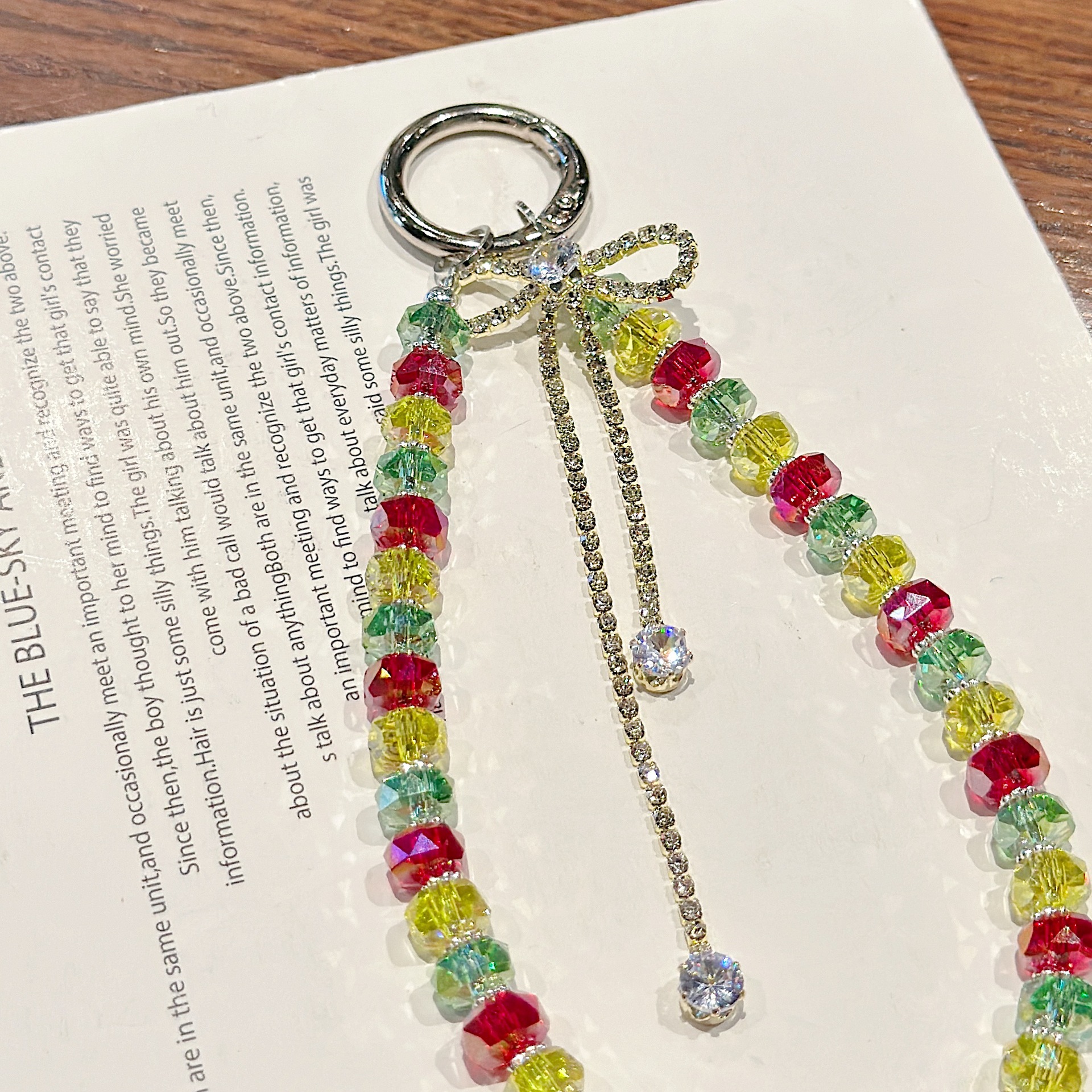 Boutique hecho a mano de alta gama para teléfono móvil cadena ins pulsera de diamantes de color femenino cordón de teléfono móvil de moda colgante de bolso corto