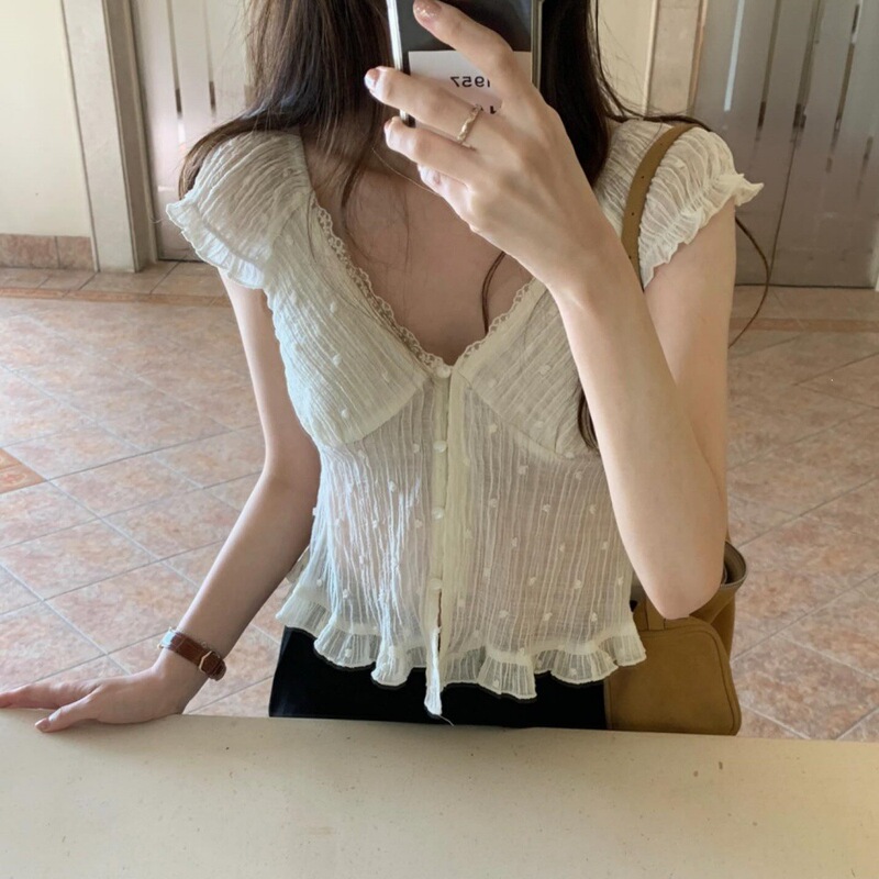 Shipped from Dongdaemun, Korea. Lace-trimmed V-neck buttoned fairy-style pleated embroidered polka dot slim-fit short-sleeve shirt Shipped from Dongdaemun, Korea. Lace-trimmed V-neck buttoned fairy-style pleated embroidered polka dot slim-fit short-sleeve shirt