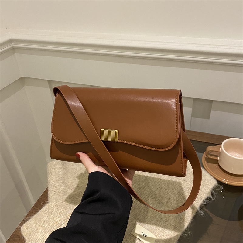 Bolsos pequeños retro para mujer 2025 nuevo estilo moda moda moda moda bolsa de mensajero hombro bolsa de axila simple bolsa cuadrada pequeña marea
