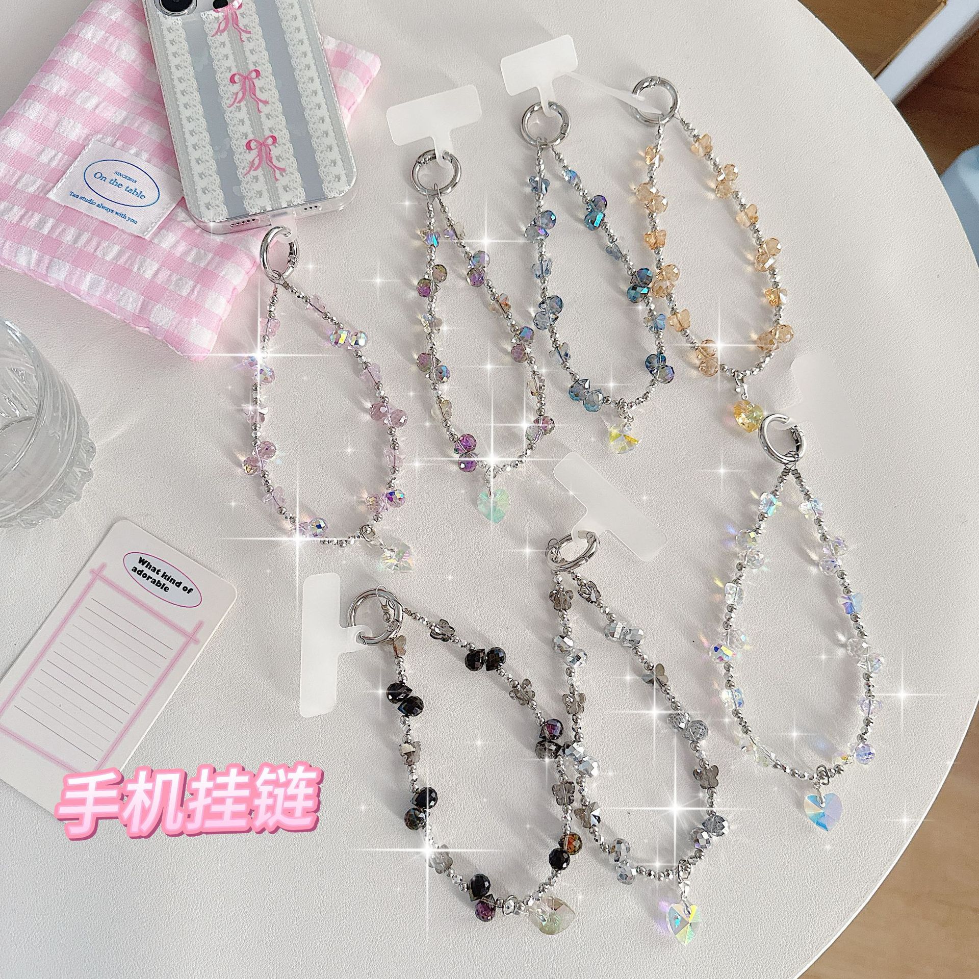 Boutique hecho a mano de alta gama teléfono móvil cadena colgante mujer ins fresa mariposa amor colgante moda teléfono móvil cadena colgante corto