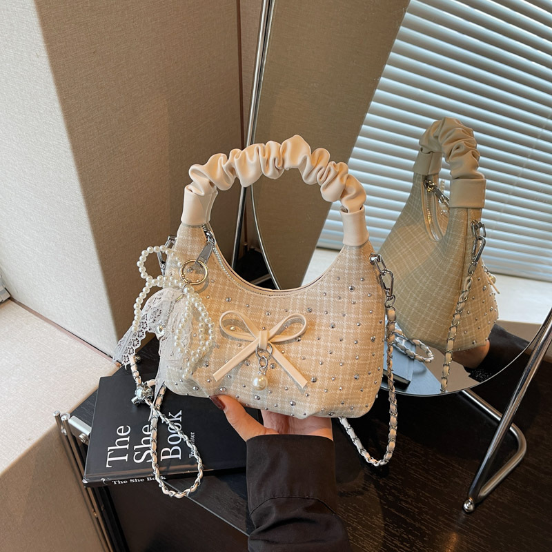 Nicho de diseño textural bolso mujer 2026 nuevo estilo de moda de verano simple bolso de hombro diario bolso brazalete