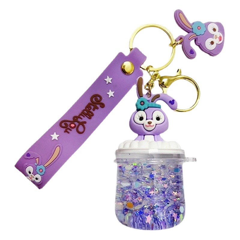 En línea de la celebridad de dibujos animados KT cristal coche llavero mujer libro bolsa colgante pequeña joyería aceite arenas movedizas estrella Delu colgante creativo