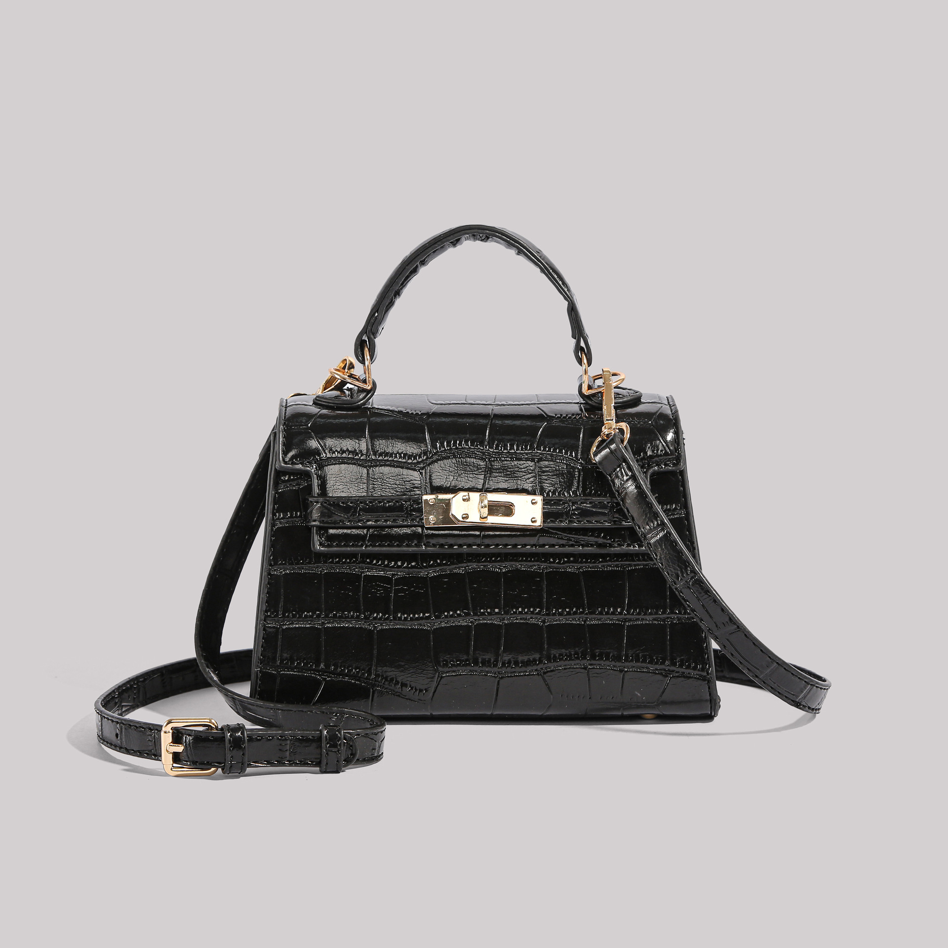 Los fabricantes venden directamente el nuevo bolso Kelly simple en 2025 con un bolso cuadrado pequeño y un bolso con patrón de cocodrilo.