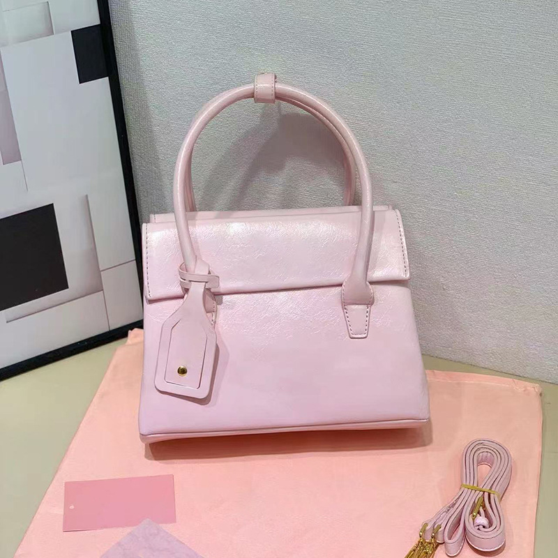 Aventure bolso de concha italiano mujer 2024 nuevo bolso de bolos retro miu bolso de mensajero portátil de cuero