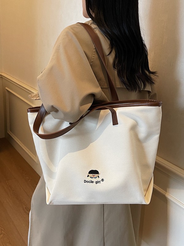 Bolsa de lona de gran capacidad para mujeres 2025 nuevo estilo urbano simple de viaje al trabajo sensación de alta calidad de moda versátil bolso de mano