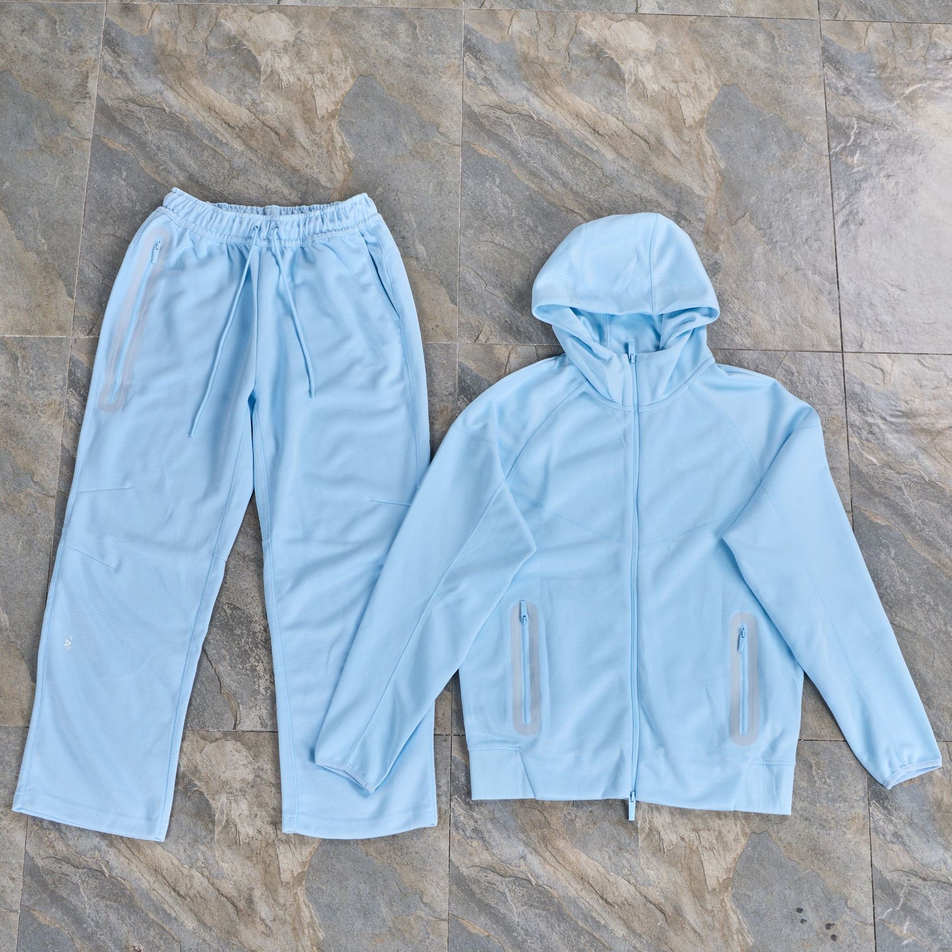 24SS otoño y invierno co-branding zipper calle chaqueta encapuchada pantalones deportivos lineales