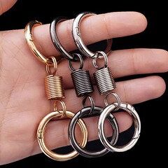 【セイコー高品】スプリング二重リングキーホルダーカップルの小さなデザイン感個性的なキーホルダーペンダント金属リング