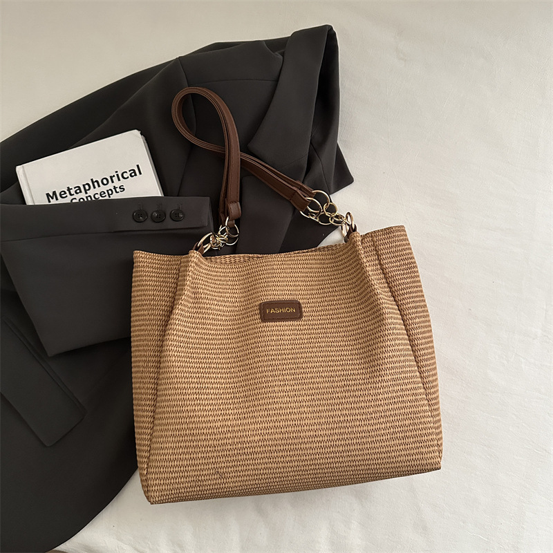 Bolso de viaje de gran capacidad para mujer 2025 verano nuevo estilo de alta gama bolso de axila de un solo hombro popular de este año bolso Tote femenino