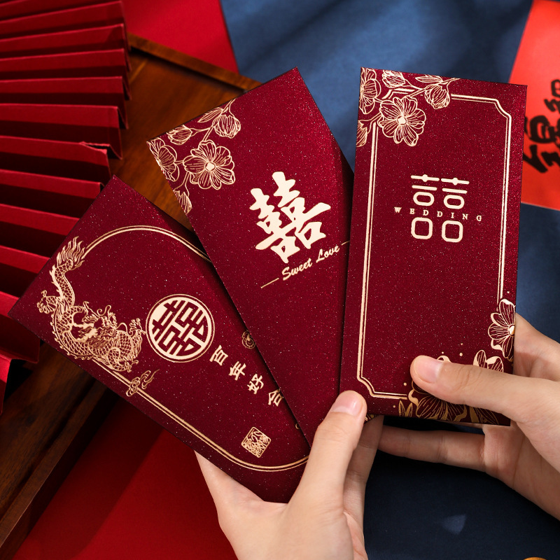 Nuevos artículos de boda, paquetes rojos de cebolla dorada con regalo, beneficios de boda, un sello creativo de miles de yuanes.