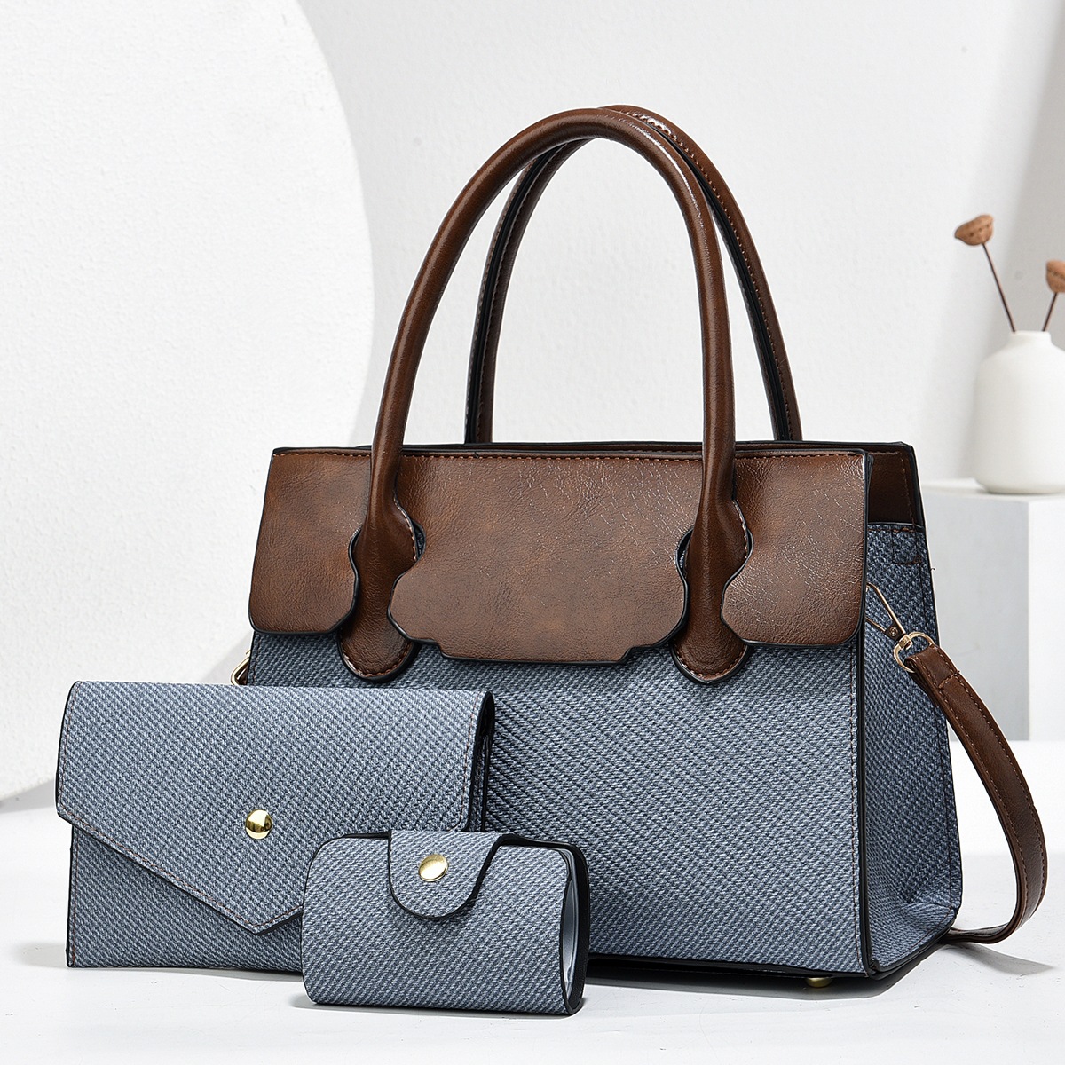 Bolso transfronterizo para niños y madres 2025 nuevo bolso femenino retro europeo y americano de tres piezas, bolso grande portátil de mensajero de un solo hombro