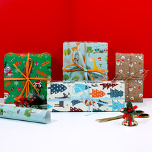 新款圣诞卡通礼物礼品包装纸礼盒包装包书纸鲜花礼品纸包装纸批发