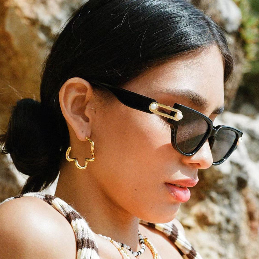 2024 nuevo marco pequeño transfronterizo moderno ojo de gato perla tendencia gafas de sol Europa y América de alta gama ropa de calle imprescindible