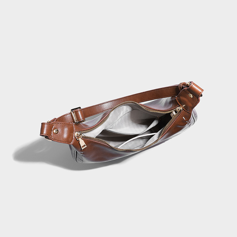 2024 Nova bolsa de ombro da moda com sentido avançado, versatilidade casual, estilo crossbody, elegância, bolsa feminina portátil_voghion.com