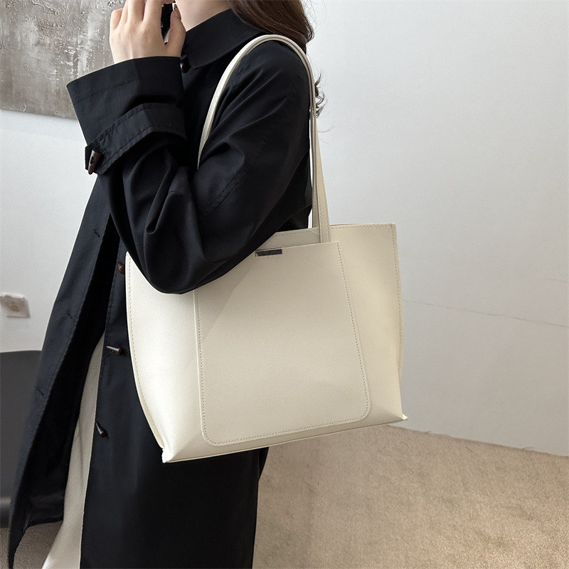 2024 otoño y invierno alta sensación de bolso de transporte de gran capacidad popular este año bolso de hombro de nicho retro bolso de tote