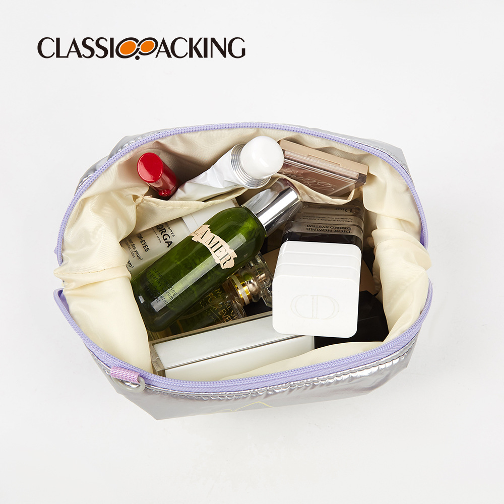 Los fabricantes venden al por mayor bolsas espaciales de otoño e invierno, bolsas de cosméticos de nicho portátiles, bolsas de lavado de moda impermeables para viajes para mujeres, se pueden agregar logotipos