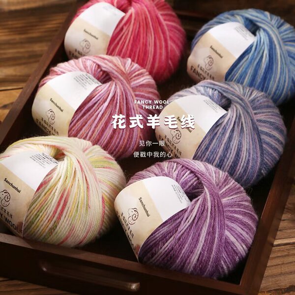 Rainbow woolen ball of yarn