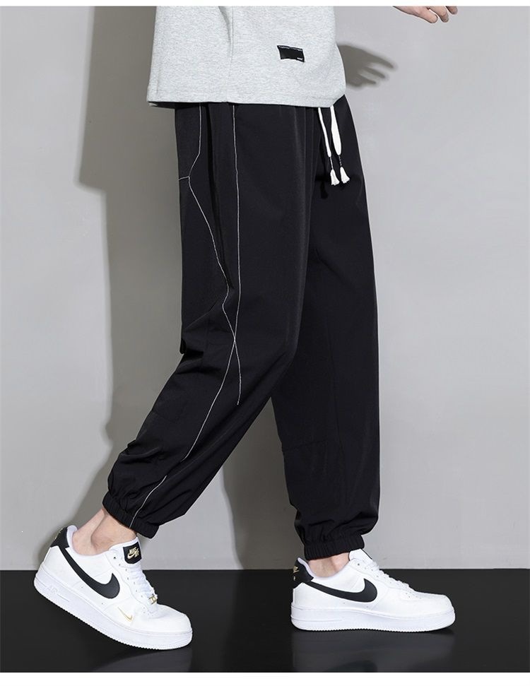 Quần jogger nam bo gấu dài ống bó, chất liệu băng lụa mỏng mùa hè, form rộng thùng thình, phong cách thể thao, nhiều size từ M đến 8XL — màu đen, màu xám đậm, màu kaki chi tiết 11