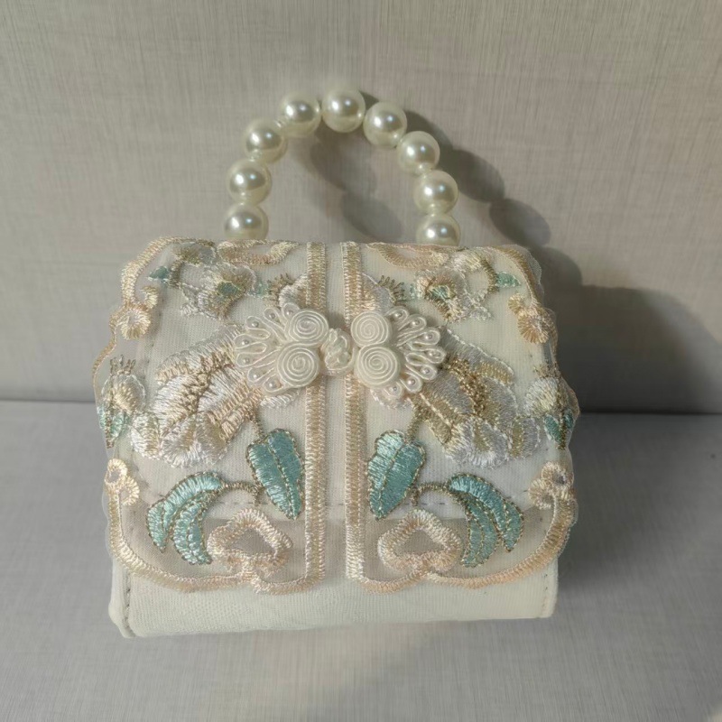 2025 primavera y verano estilo caliente moda casual niños dulces bolsa de gelatina mini bolso de mensajero de un solo hombro variedad al por mayor