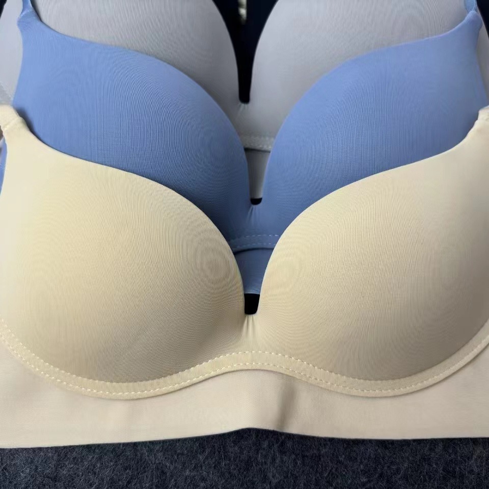 Verano brillante sin marcas sin marcas ropa interior gruesa sexy sujetador contra el pecho caída sujetador al por mayor