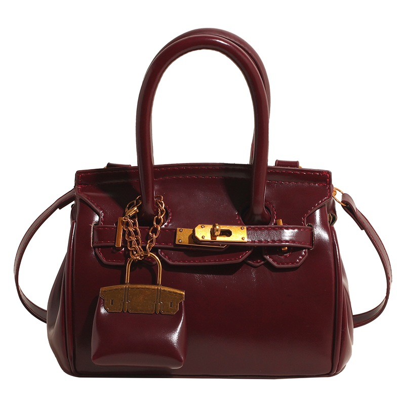 Bolso para mujeres 2025 nuevo cross-border multifuncional retro mochila de hombro nicho bolso de oro de lujo ligero