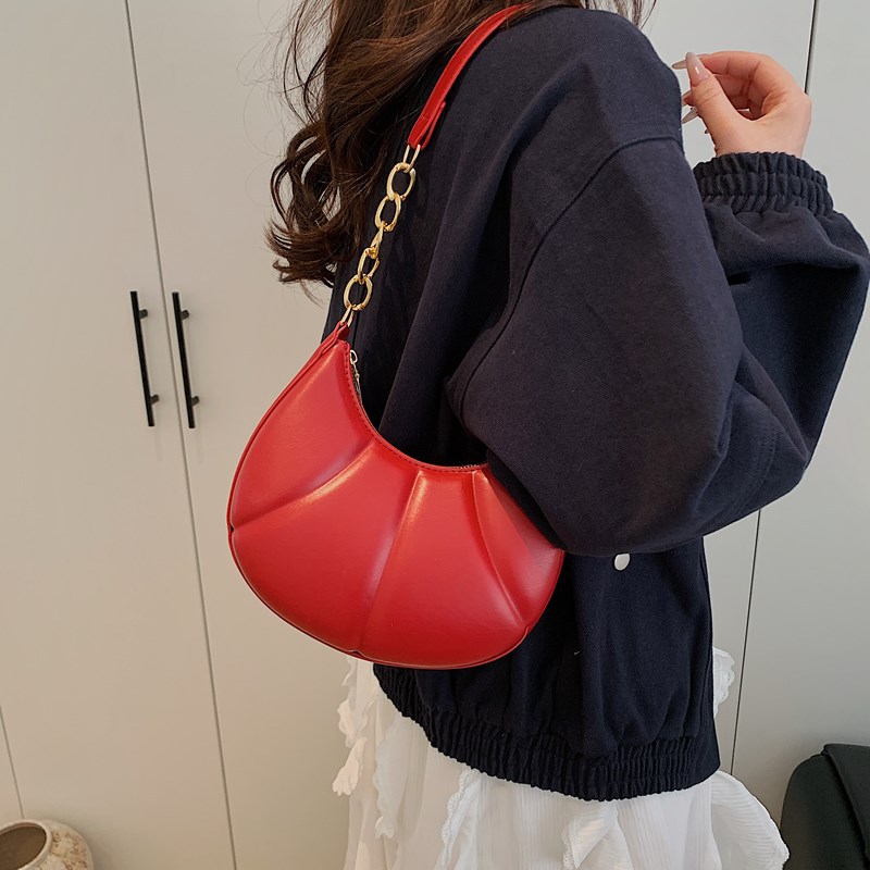 Bolsos tendencia femenina nuevo estilo 2025 primavera y verano todo-fósforo diseño de nicho textura popular de este año bolso pequeño de mensajero de axila