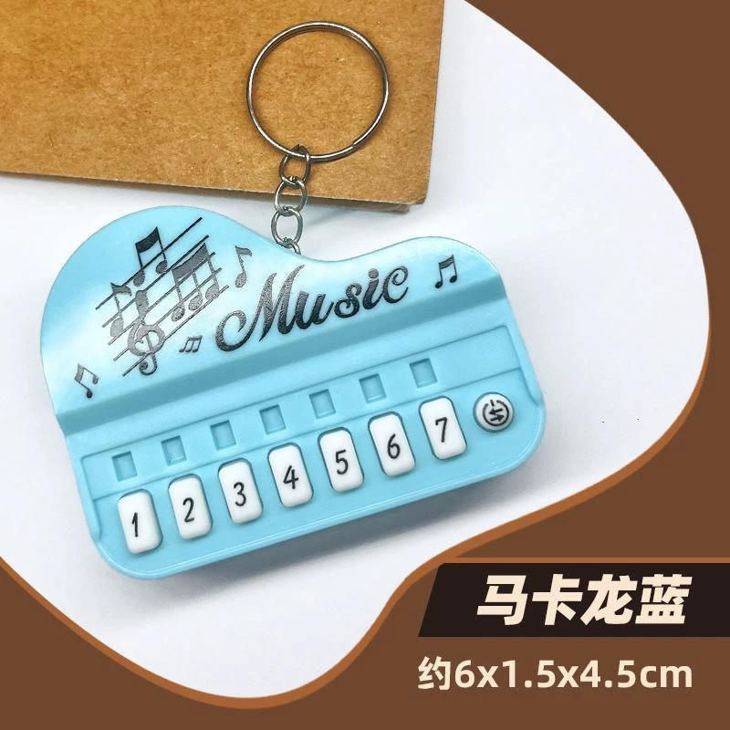 Small keychain, musical instruments, cartoon toy, equipment bag, car keys, pendant