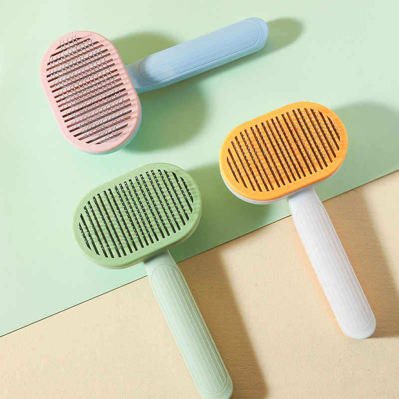 Cruzar la frontera en stock Pi auto-limpieza peine para mascotas perro gato limpieza con un solo clic depilación T9 aguja de acero inoxidable peine