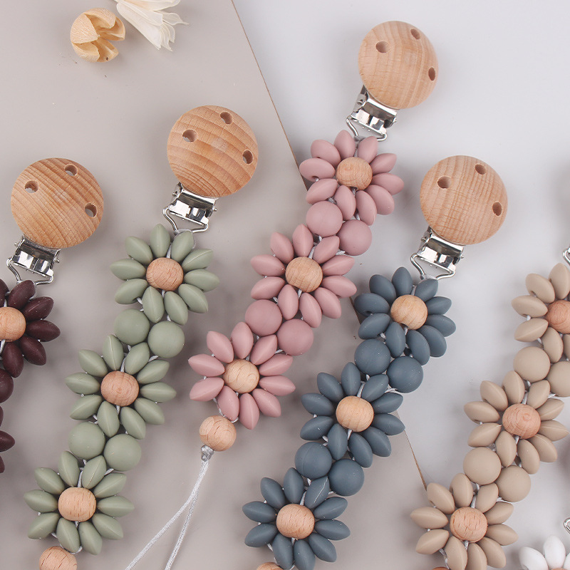Nuevos productos para bebés, clip de chupete redondo de madera de haya, reconforta la cadena de chupete de silicona de girasol del bebé