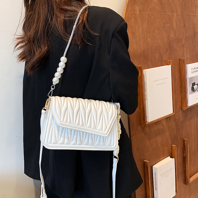 Lihtne niši disainiga kott Naiselik temperament Kevad Uus rombikujulise tikitud niidiga väike ruudukujuline kott, tipptasemel tekstuuriga õlakott_voghion.com