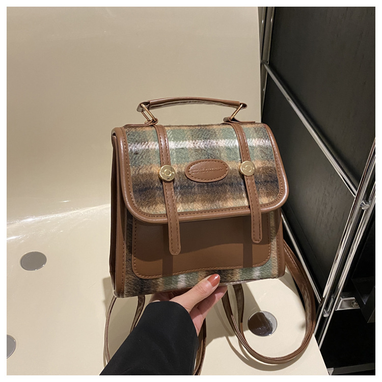 Alta textura simple color sólido estilo coreano bolso de las mujeres 2023 invierno nuevo nicho diseño hombro crossbody bolso