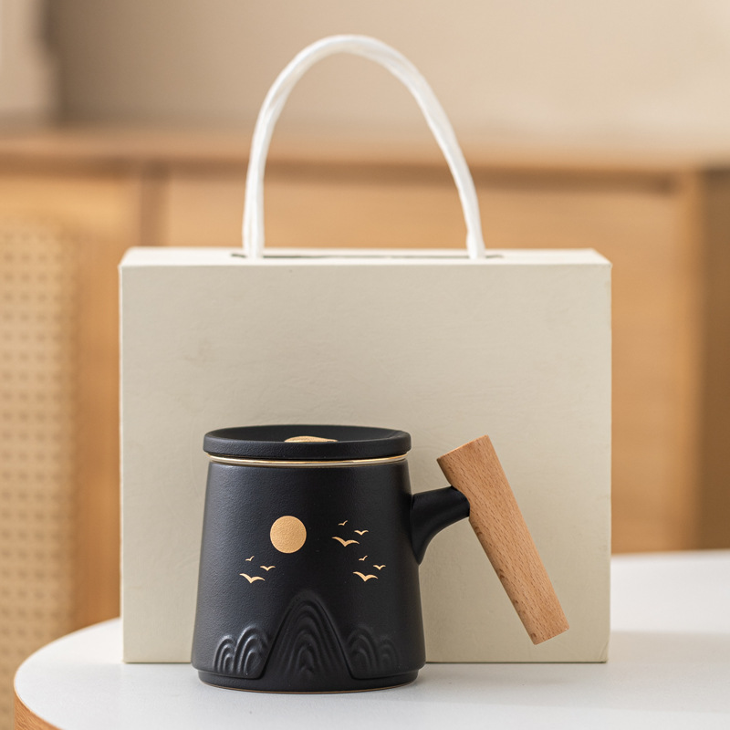 Guofeng Wenchuang marca taza de cerámica Zhoushan tres piezas juego de regalo de mano taza de calentamiento tallado comercial LOGO nombre