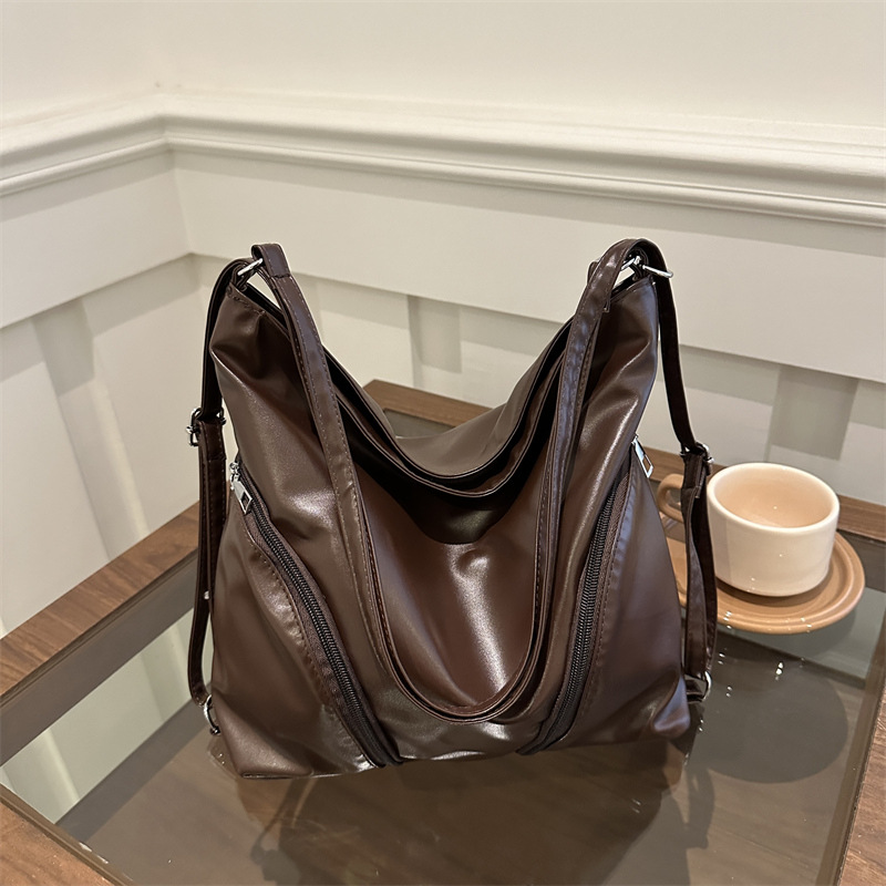 Mochila de hombro para mujeres 2025 nueva moda versátil para estudiantes universitarios en clase, mochila de viaje de gran capacidad