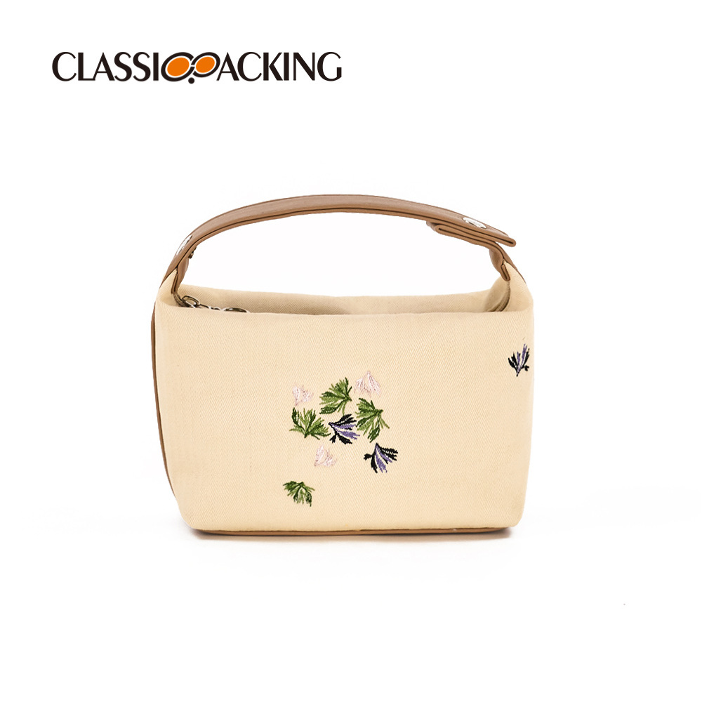 Bolso de mano cosmético de estilo nacional con LOGOTIPO impreso Bolso de lona de alta apariencia portátil del todo-fósforo del arte del bordado