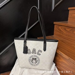 25 新しいクラシック多用途大容量トートバッグ女性用バッグ韓国の人気のクロスボーダーシンプルなシングルショルダー脇の下バッグ