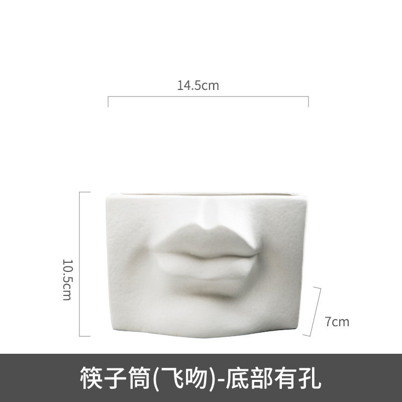 Venta directa de fábrica Soporte de tubo de palillos simple Tubo de cerámica de lujo ligero Adornos cuadrados Cara humana creativa nórdica Tubo de almacenamiento abstracto image 11