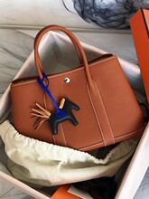 �ֹ�Ϟ��Garden party���@��TogoţƤ�̄���������eͨ������Ů��